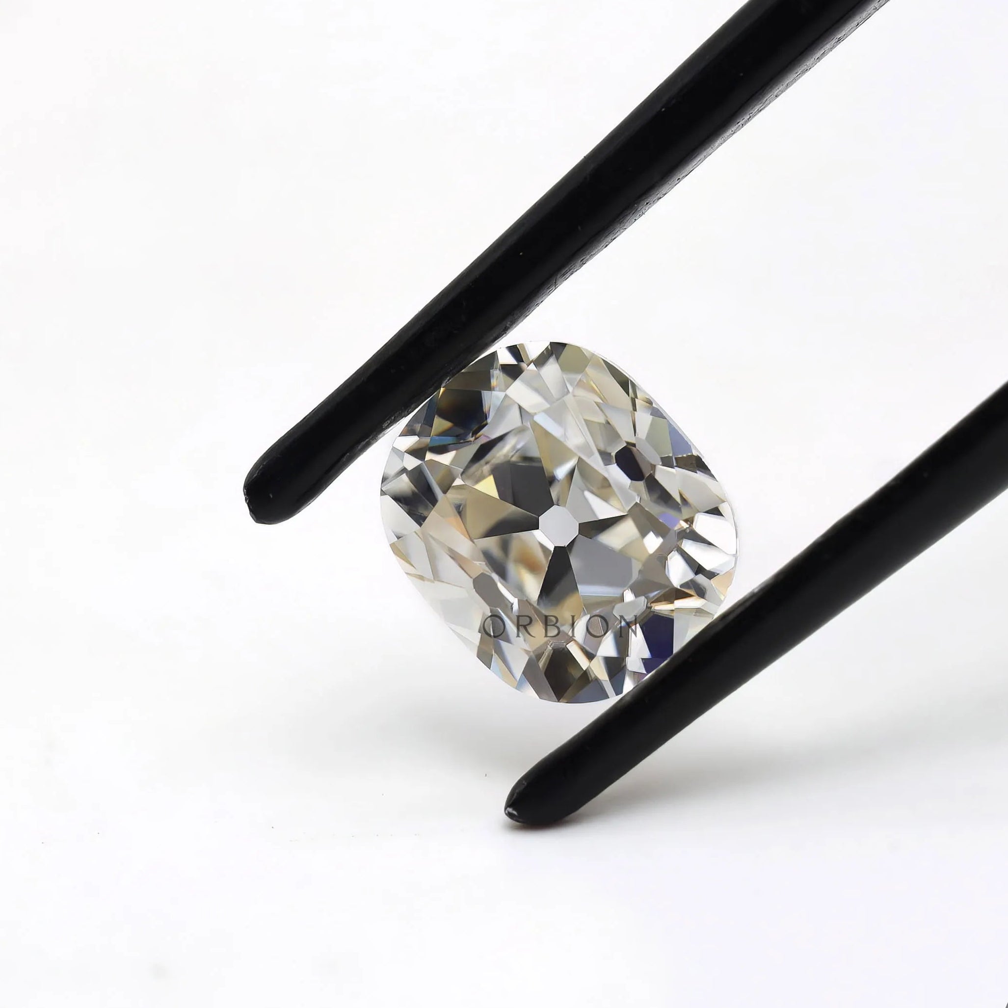 Off white elongated cushion moissanite 1.20 ct antique old mine cut stone