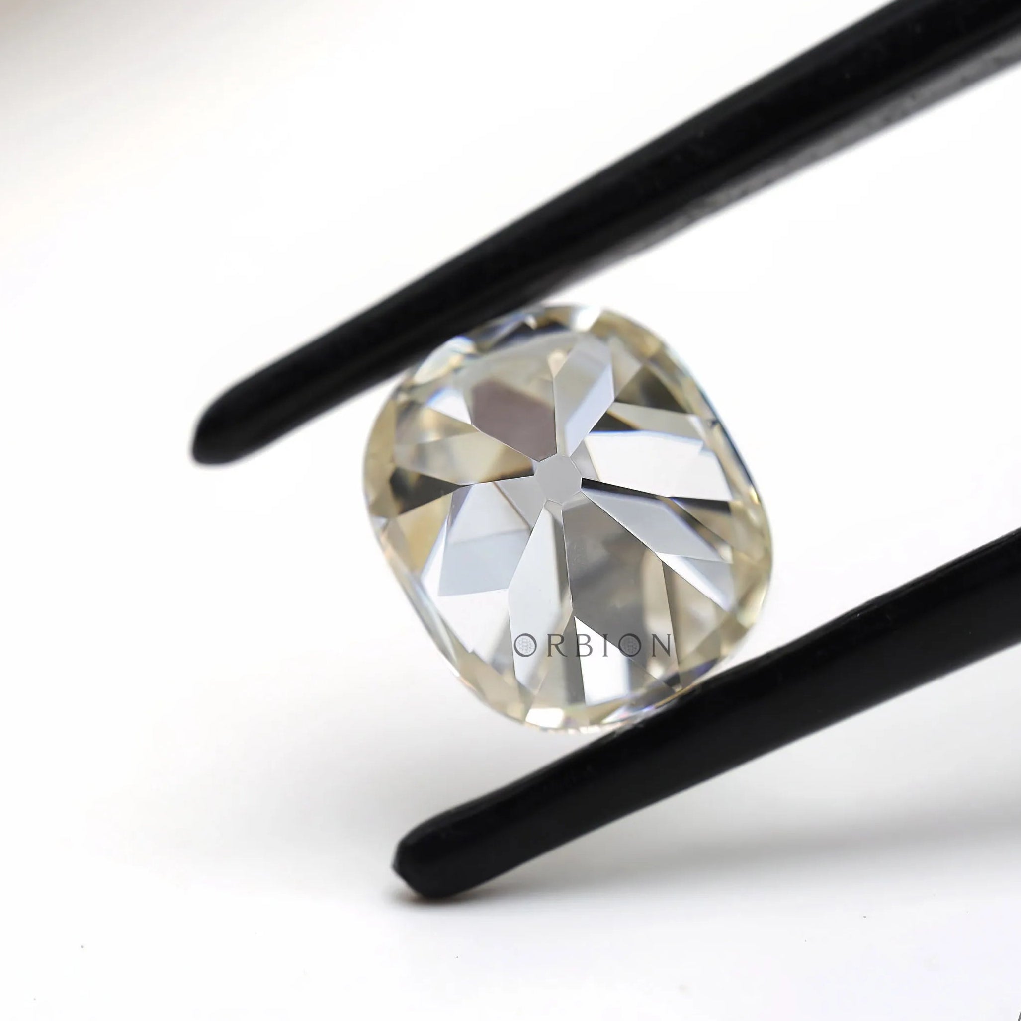 Vintage style elongated cushion moissanite 1.20 ct in off white color