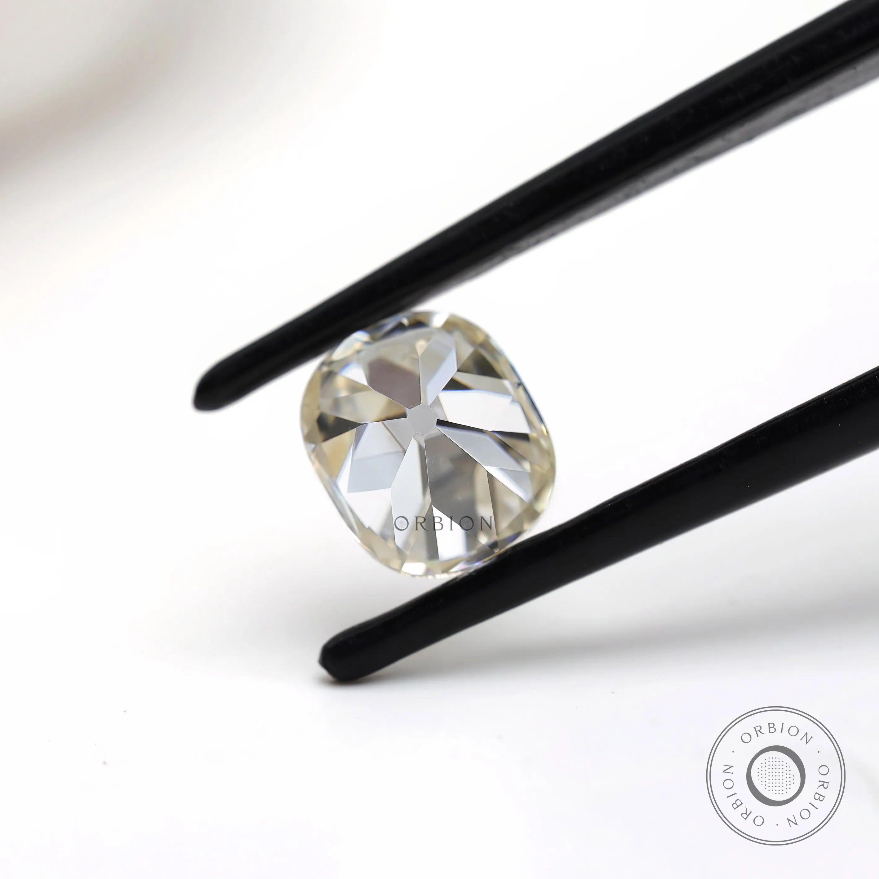 Vintage style elongated cushion moissanite 1.20 ct in off white color