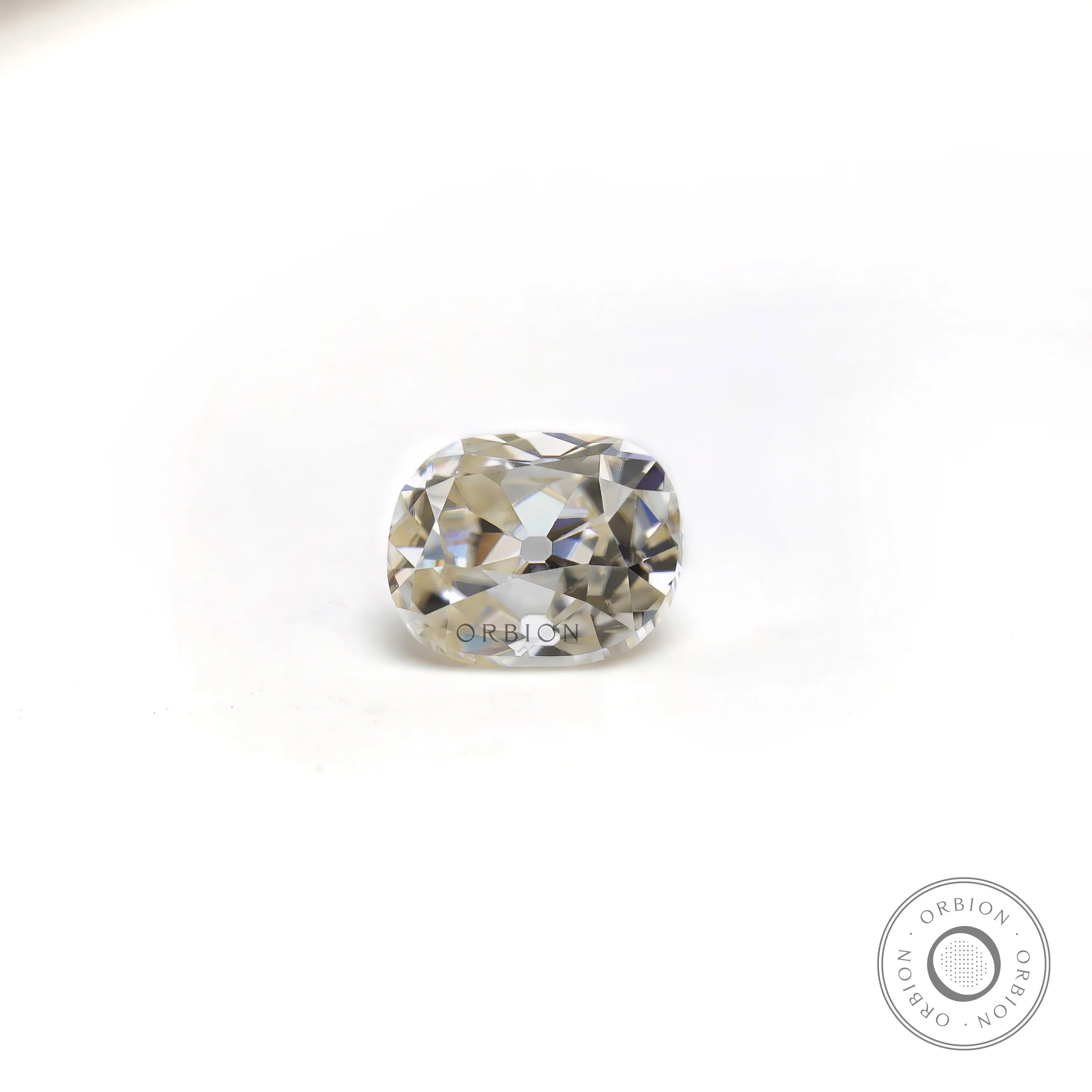1.20 ct Moissanite elongated cushion with soft off white tone vintage cut