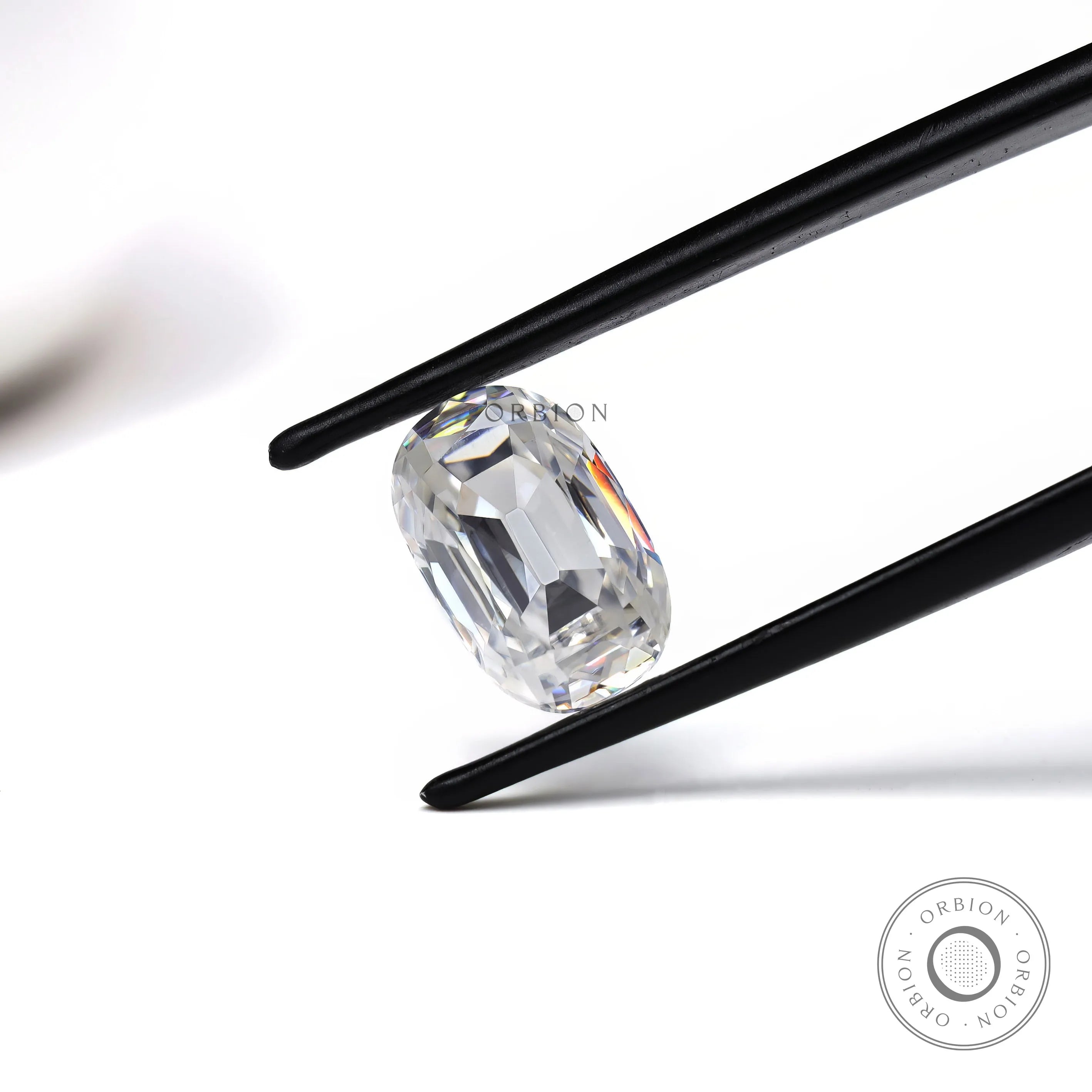 elongated cushion moissanite stone with vintage faceting in close view