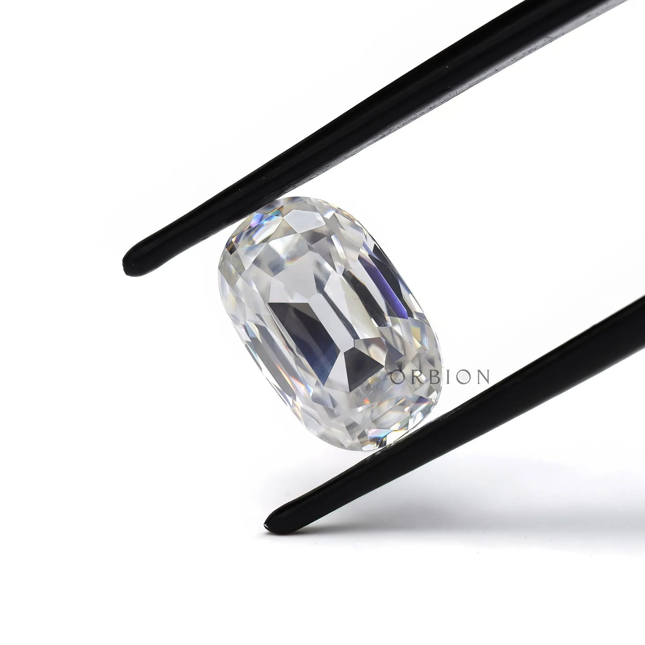 old mine cut elongated cushion moissanite showing facet reflections