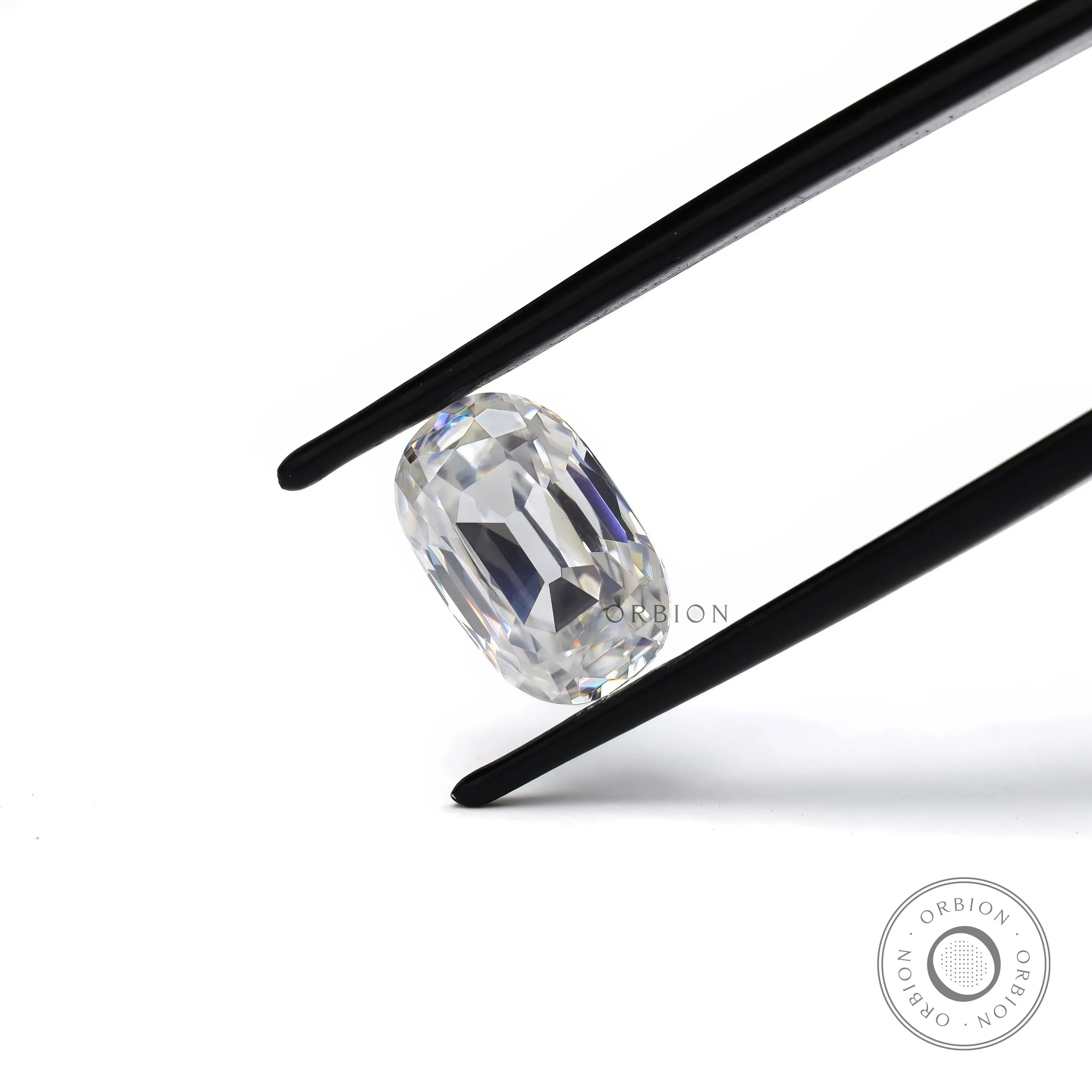 old mine cut elongated cushion moissanite showing facet reflections