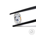 elongated cushion old mine cut moissanite held in tweezer showing side profile