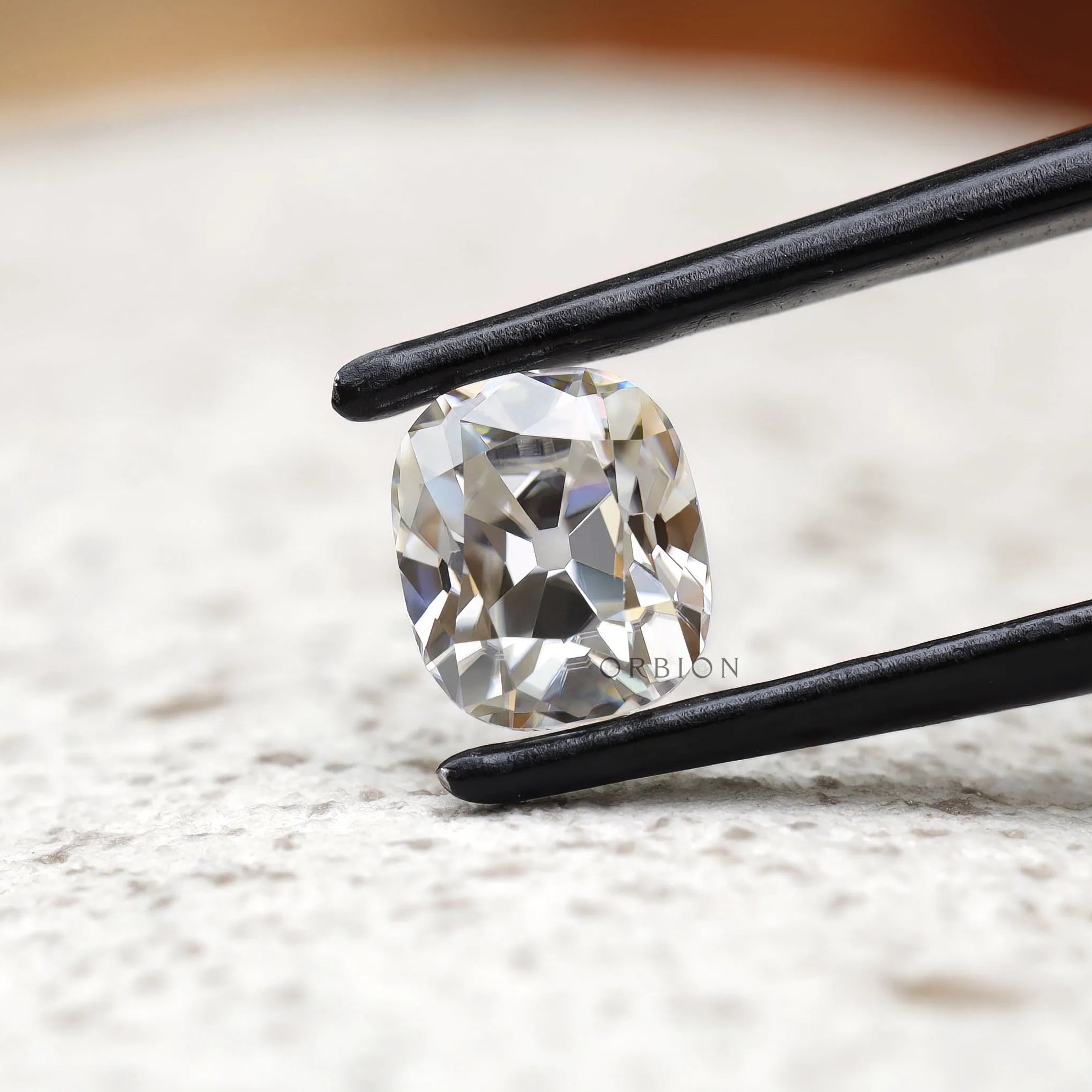 Elongated cushion moissanite 1.20 ct with old mine faceting clear stone