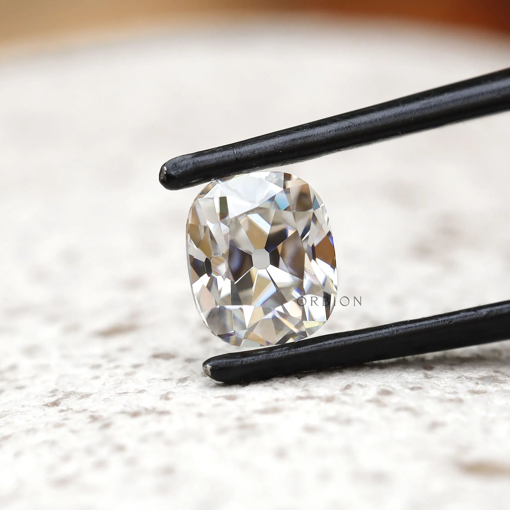 Colorless elongated cushion moissanite 1.20 ct vintage old mine cut stone
