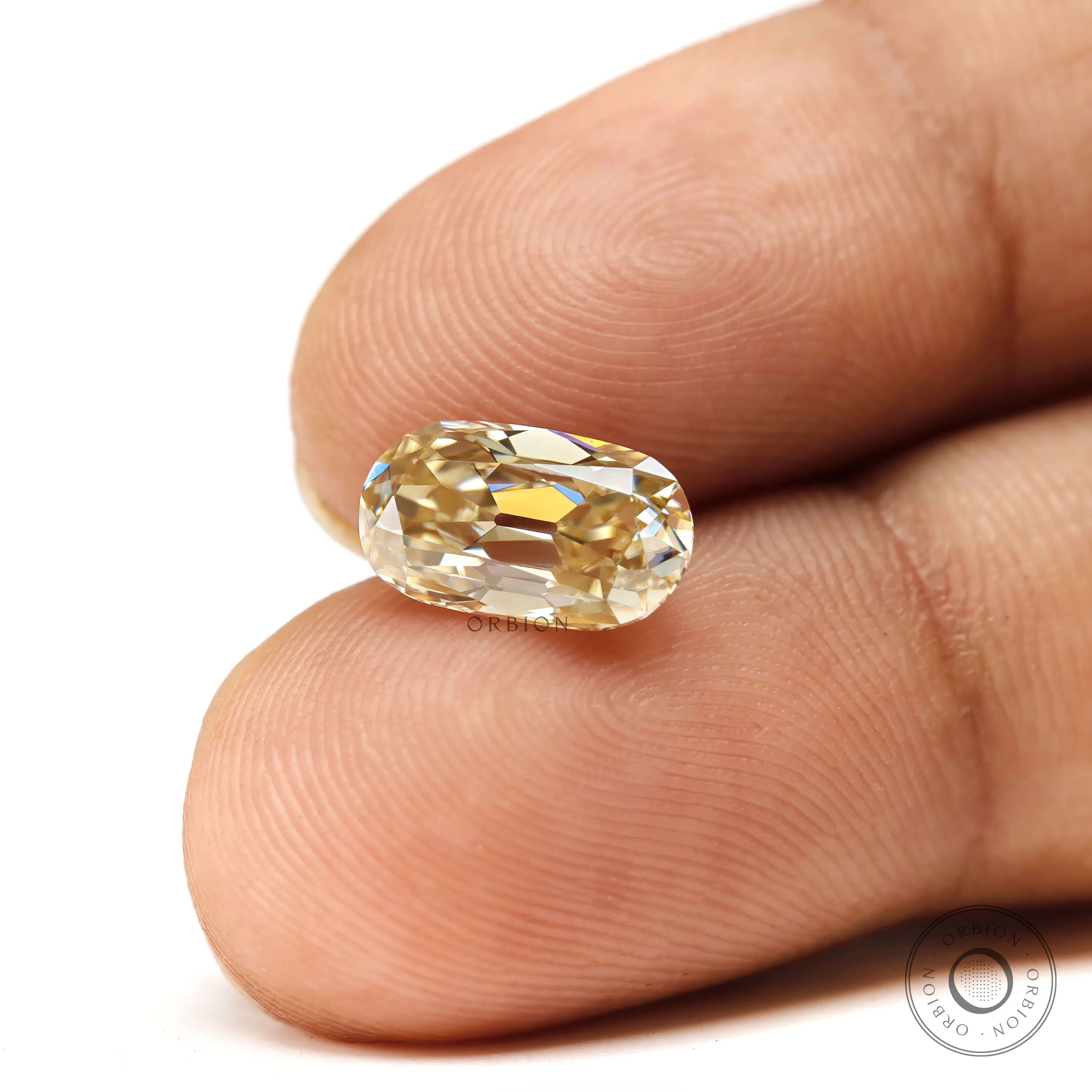 Yellowish champagne moissanite elongated cushion old mine cut loose stone