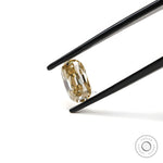 Old mine cut elongated cushion yellowish champagne moissanite close view