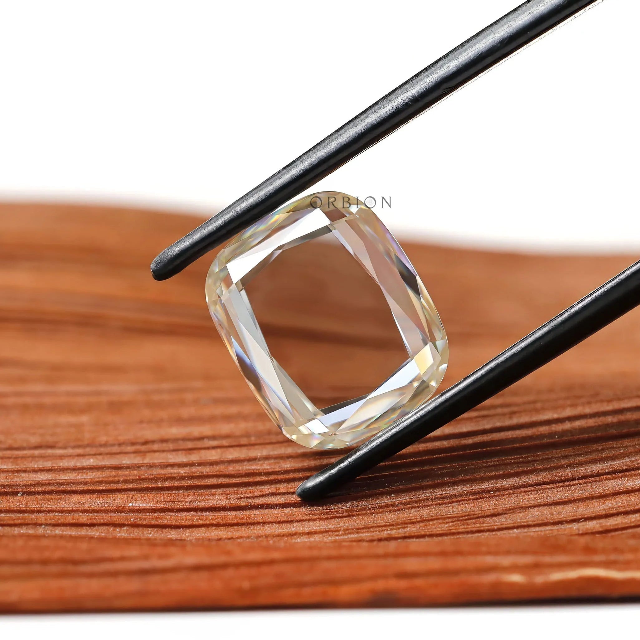 Portrait cut elongated cushion moissanite colorless flat cut stone