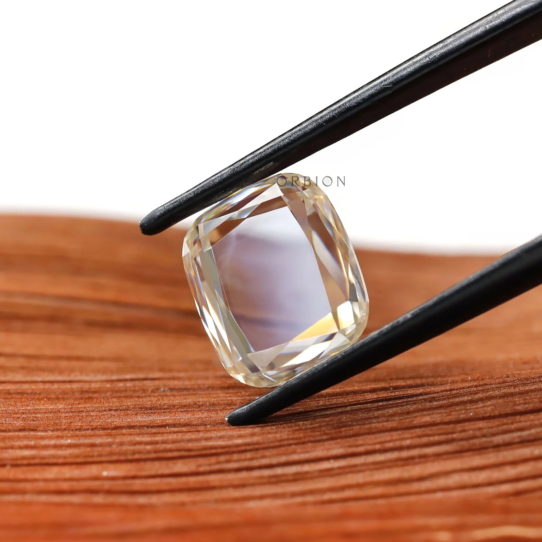 Colorless elongated cushion portrait cut moissanite fancy gemstone