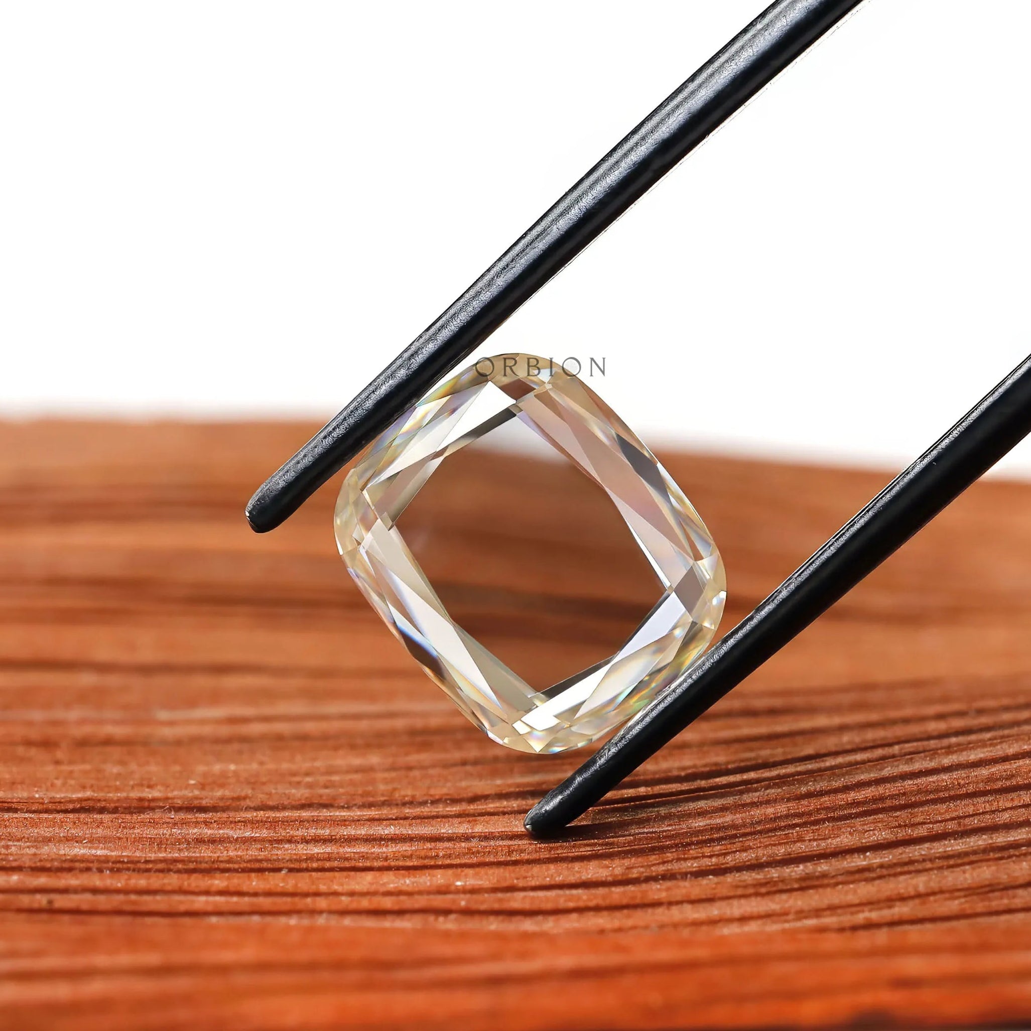 Portrait cut moissanite elongated cushion