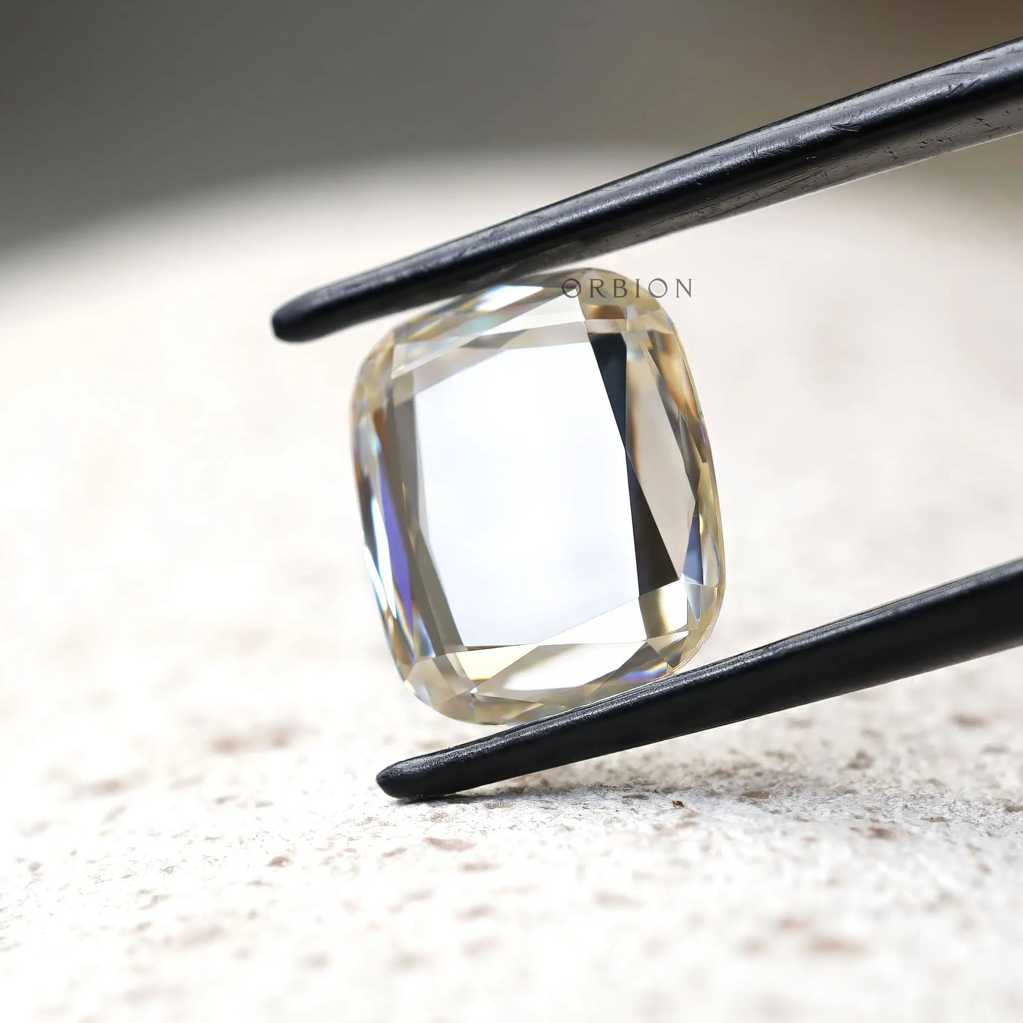 Solitaire cushion cut colorless moissanite
