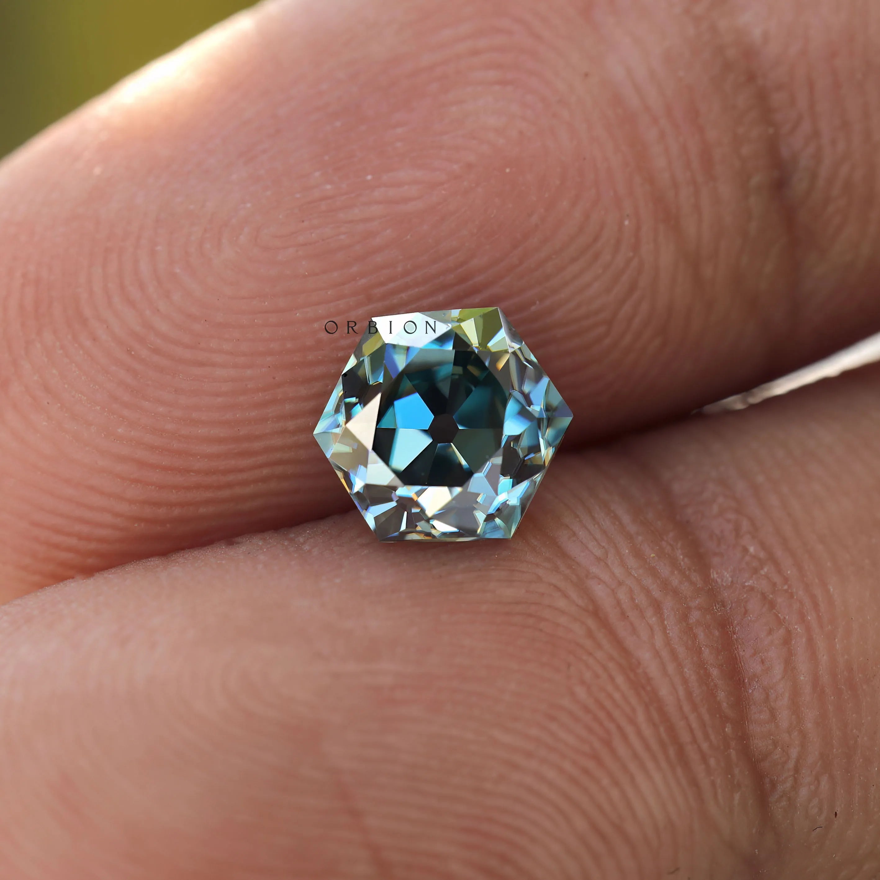 Hexagon cut moissanite 1.60 ct in deep blue green shade
