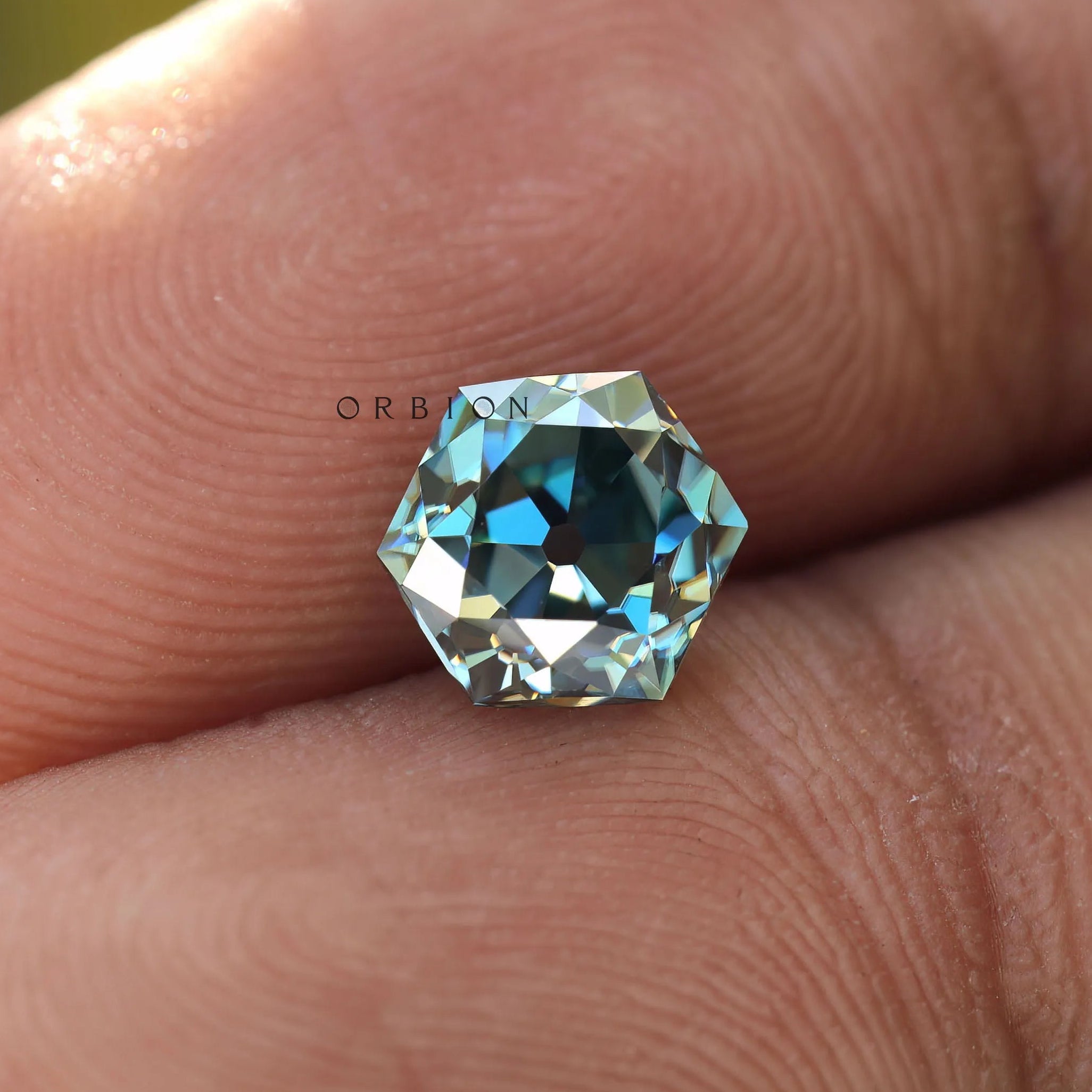 1.60 ct Loose hexagon moissanite with vibrant blue green color