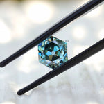 1.60 ct OMC hexagon moissanite with ocean blue green hue