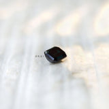 Loose emerald shape moissanite black green shade top view