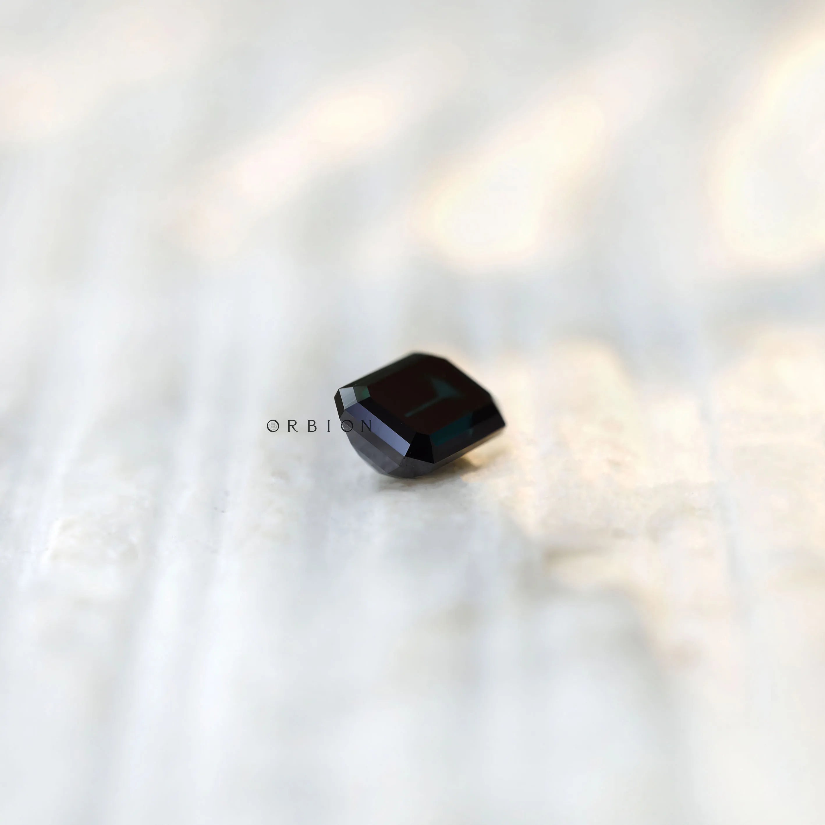Loose emerald shape moissanite black green shade top view