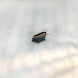 Black green moissanite step cut emerald shape side profile