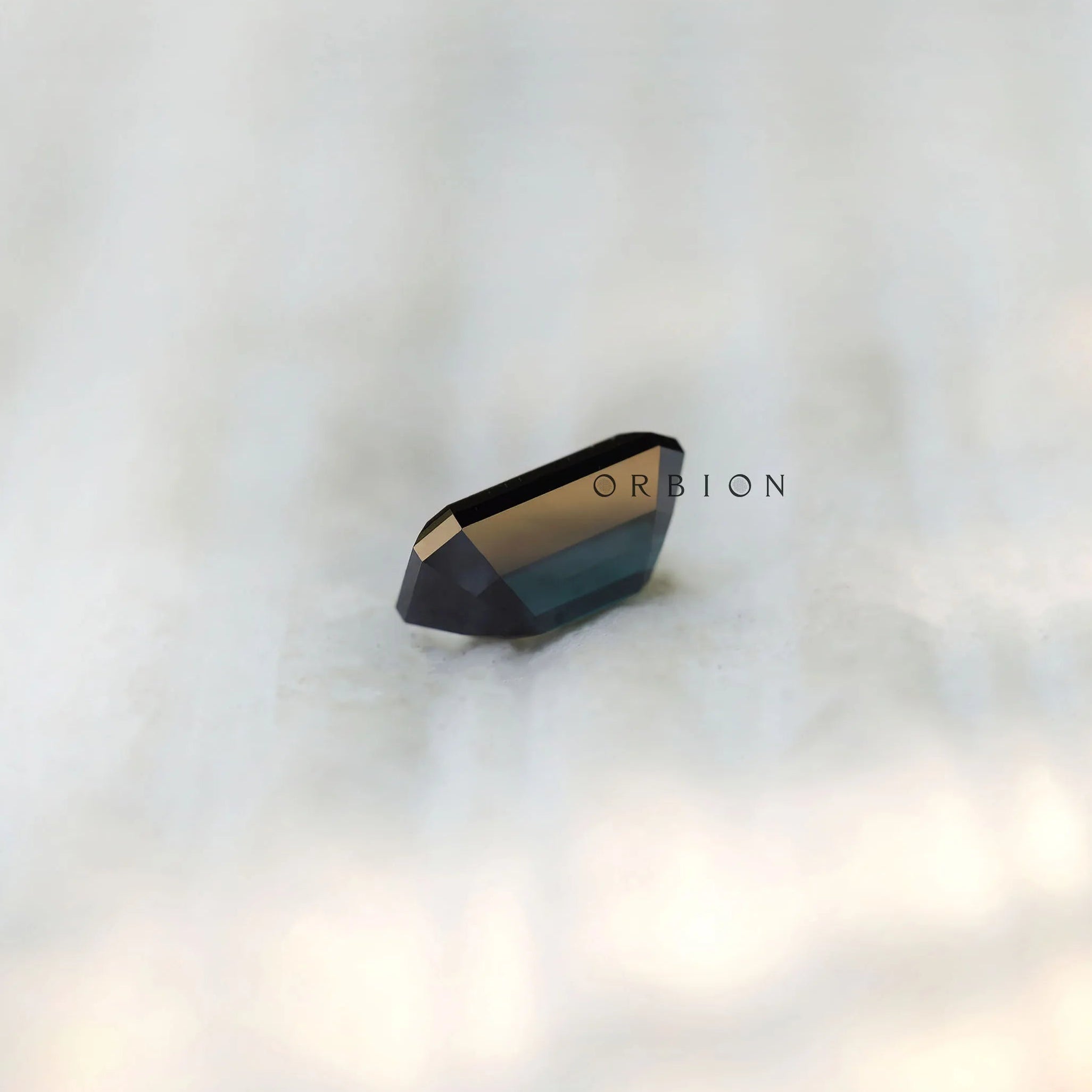 Black green moissanite step cut emerald shape side profile