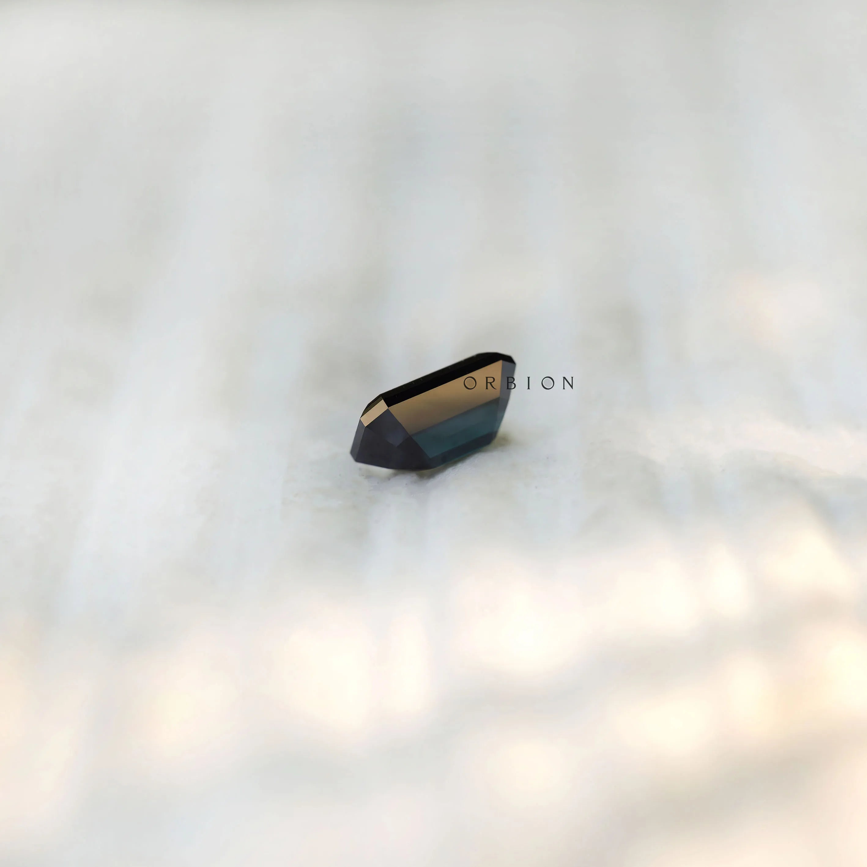 Black green moissanite step cut emerald shape side profile