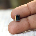 Loose emerald moissanite stone with reflective step facets