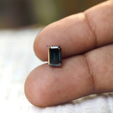 Loose emerald moissanite stone with reflective step facets