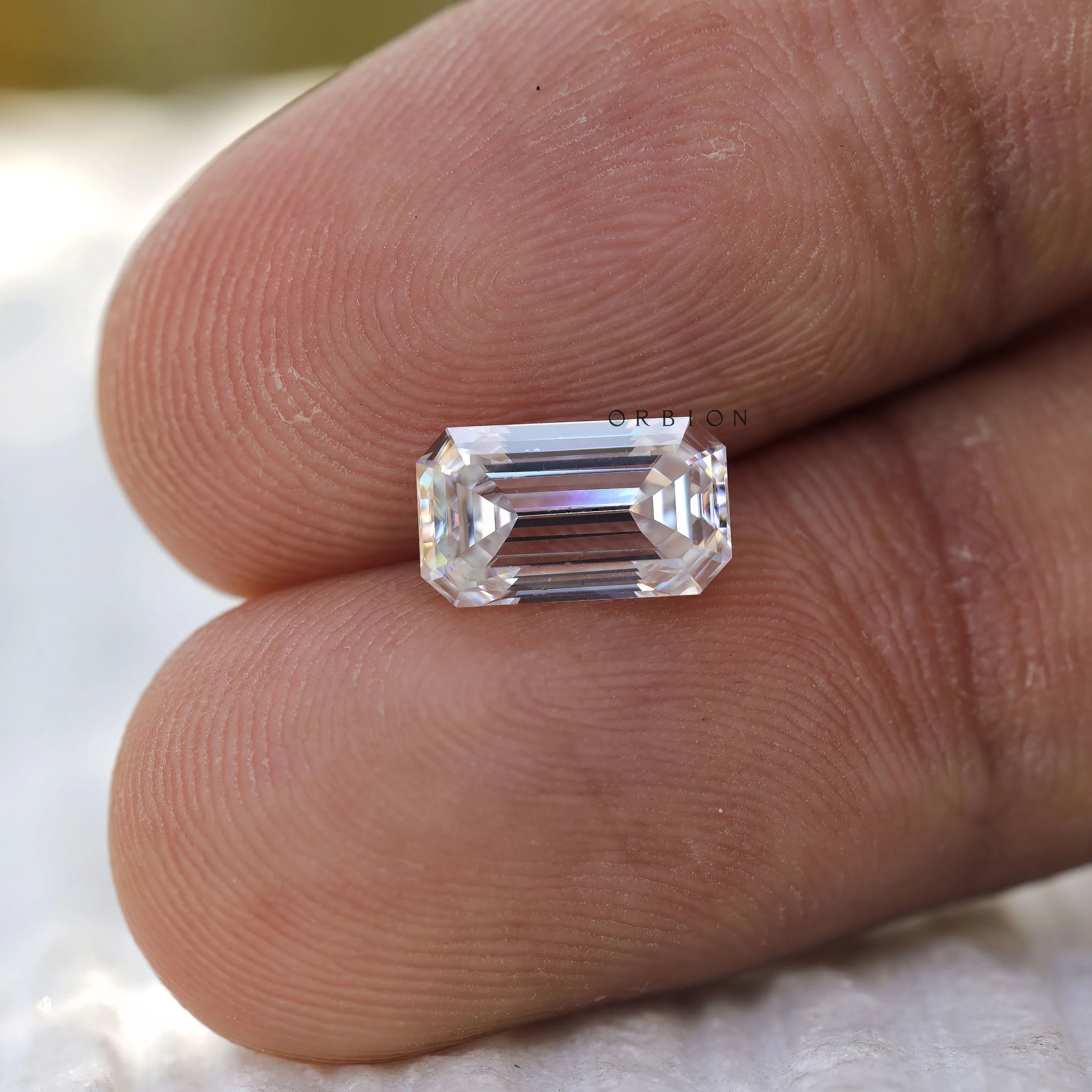 2 CT Colorless elongated emerald cut moissanite gemstone