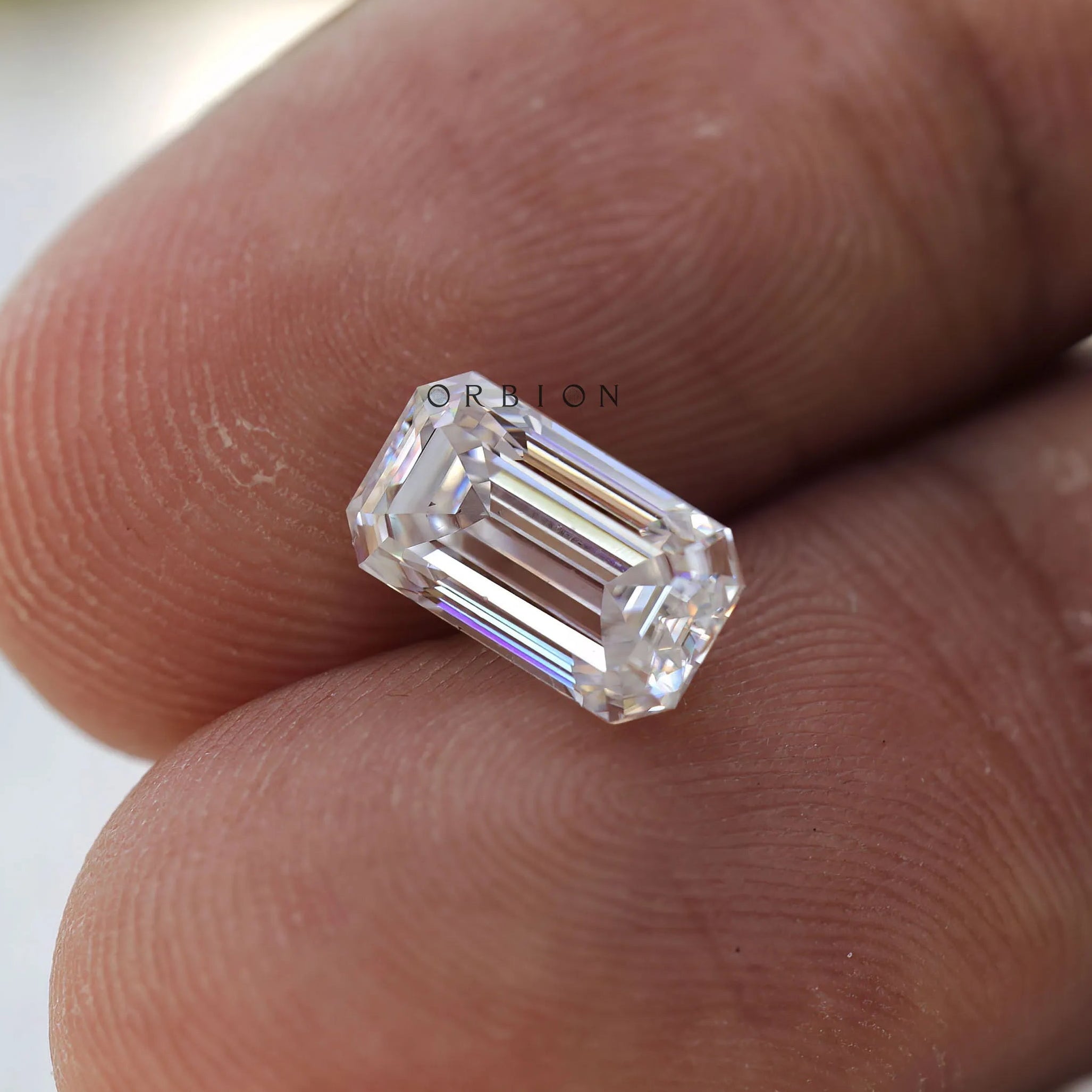 Loose 2 CT colorless moissanite elongated emerald cut stone