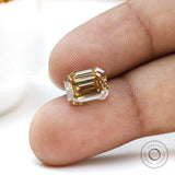 Dark champagne moissanite gemstone with crisp step cut symmetry