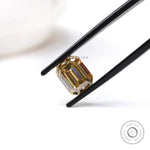 Emerald cut moissanite stone in bold dark champagne shade