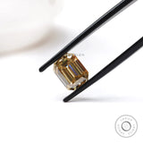 Emerald cut moissanite stone in bold dark champagne shade