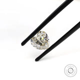 Brilliant cut heart moissanite showing facet sparkle close up