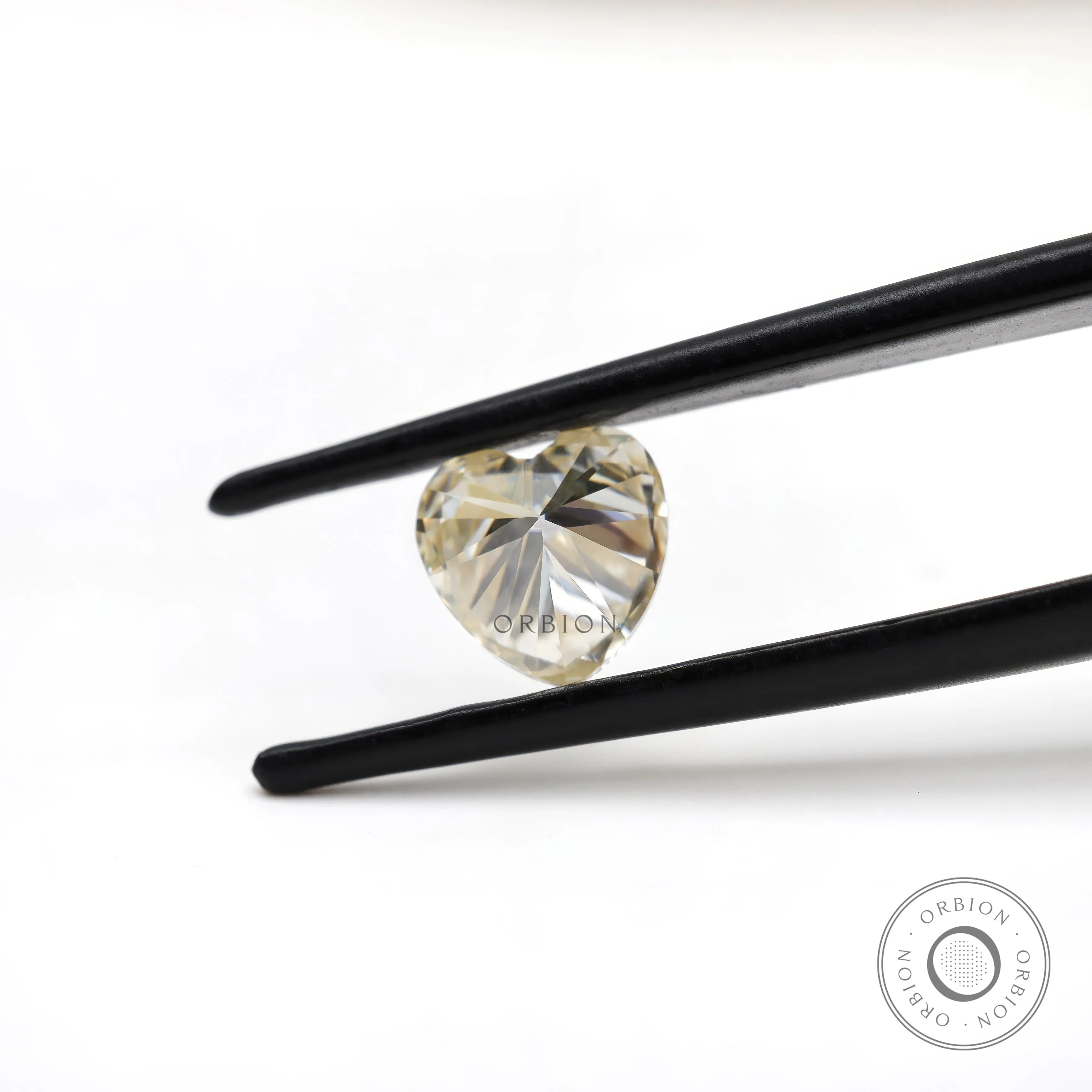 Detailed facet pattern of heart shape moissanite stone