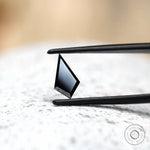 Geometric black moissanite stone step cut profile view