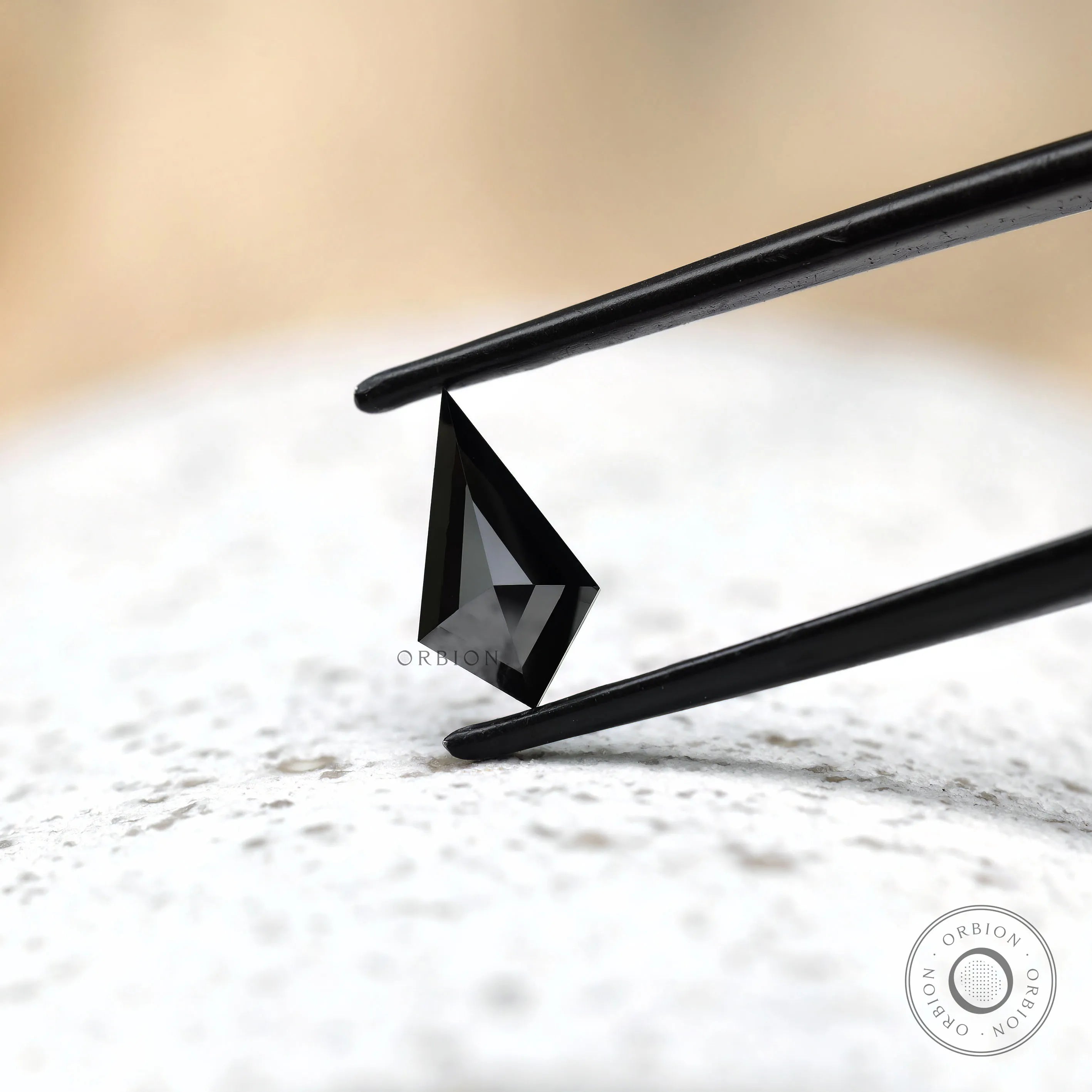 Modern black kite cut moissanite minimal background