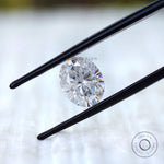 Loose oval moissanite showing brilliant cut facets