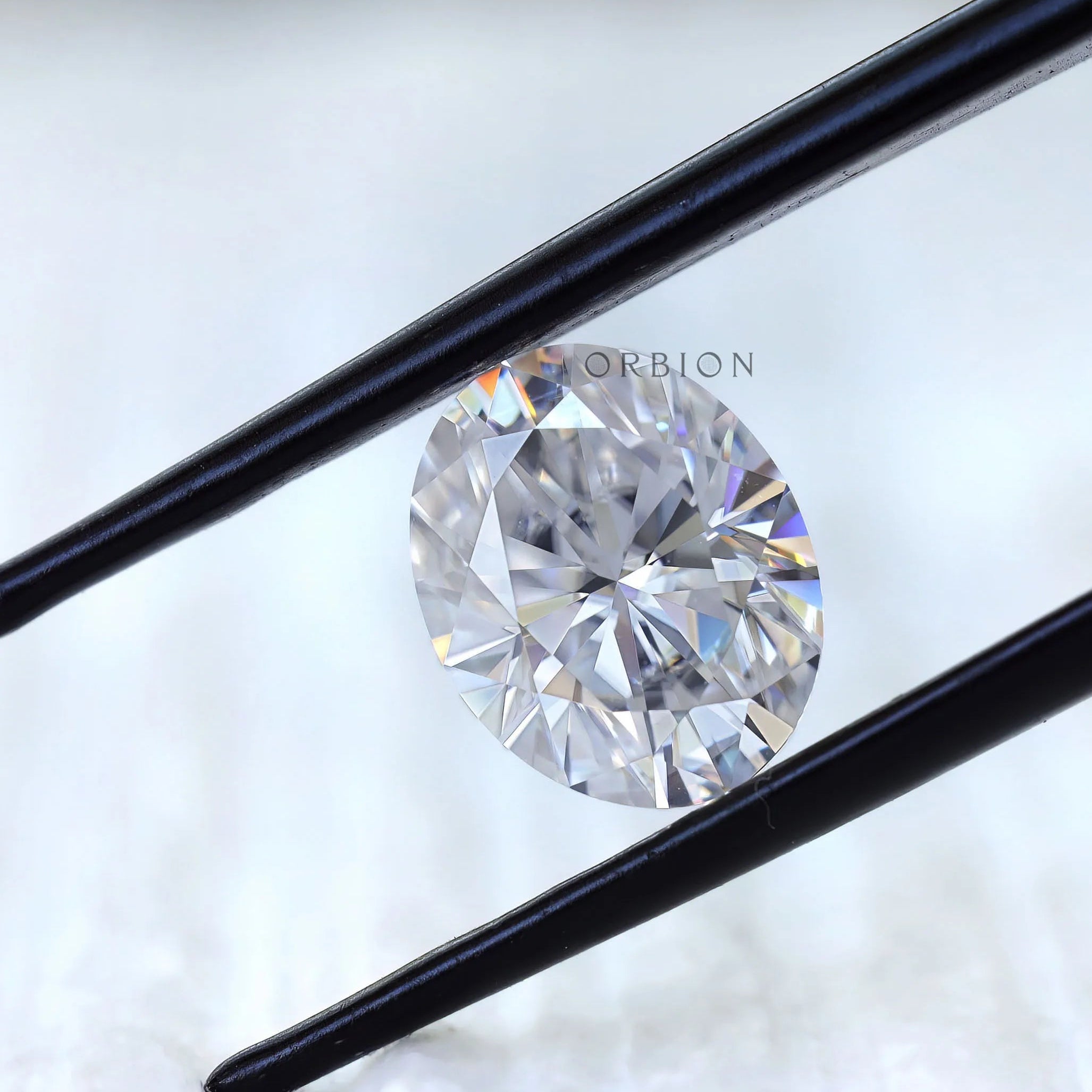 Loose oval moissanite showing brilliant cut facets