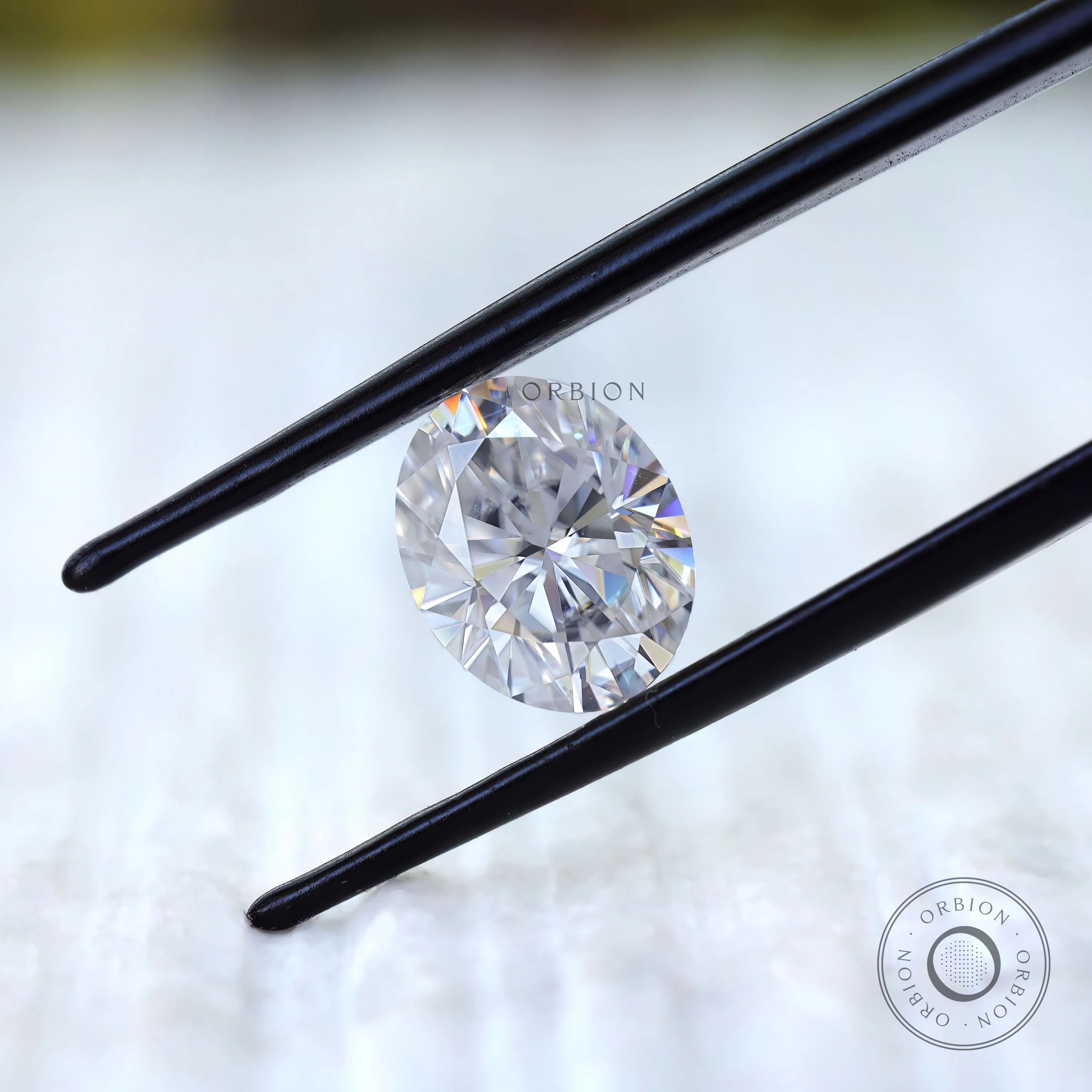 Loose oval moissanite showing brilliant cut facets