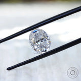 Crushed ice oval moissanite reflecting natural light