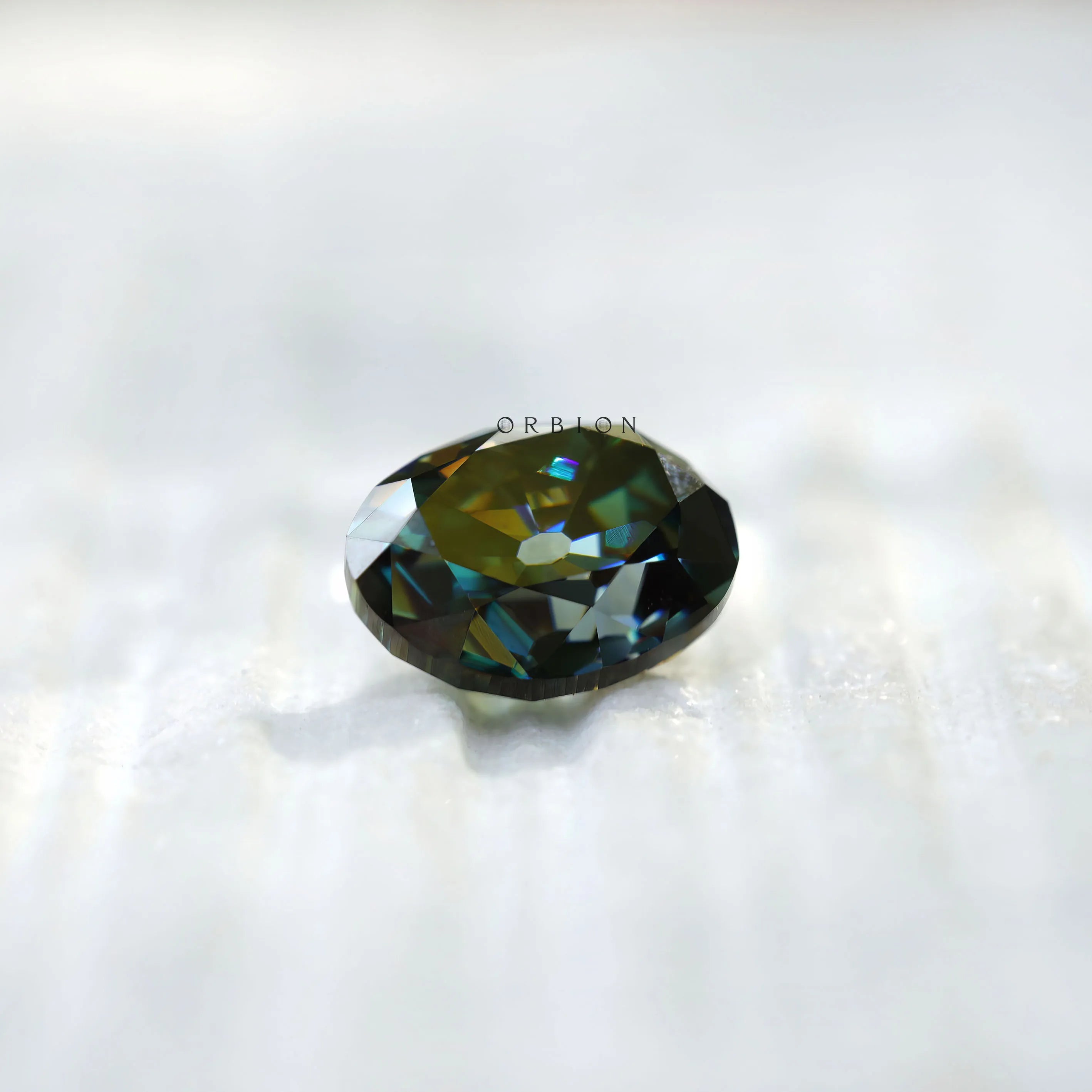 Oval Old Mine Cut moissanite rich green tone reflection