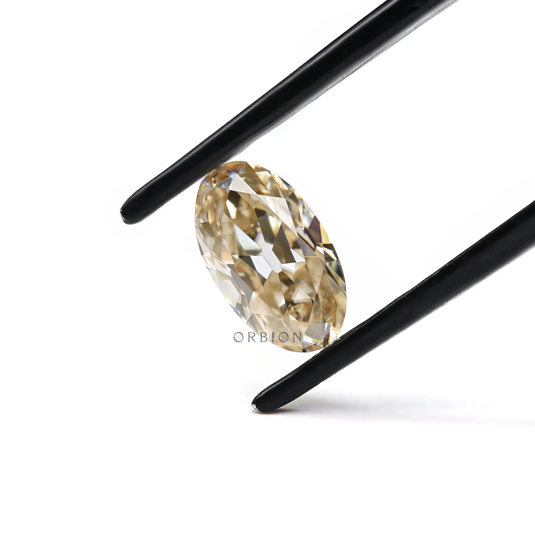 Oval moissanite light champagne vintage faceting close view