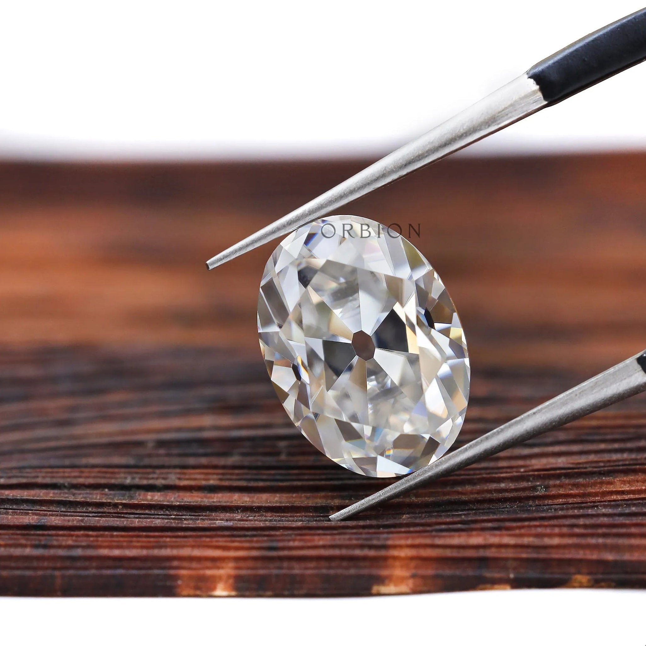 Vintage oval moissanite 3.40 ct with classic old mine faceting