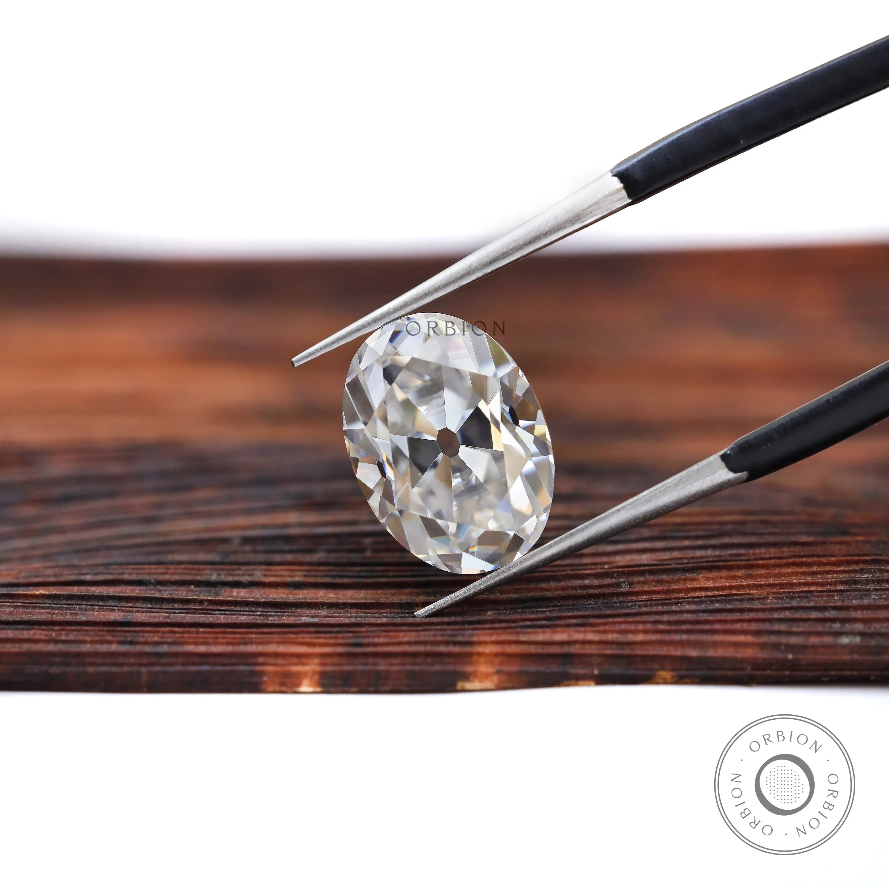 Vintage oval moissanite 3.40 ct with classic old mine faceting