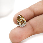 Custom jewelry pear moissanite in rich warm champagne shade