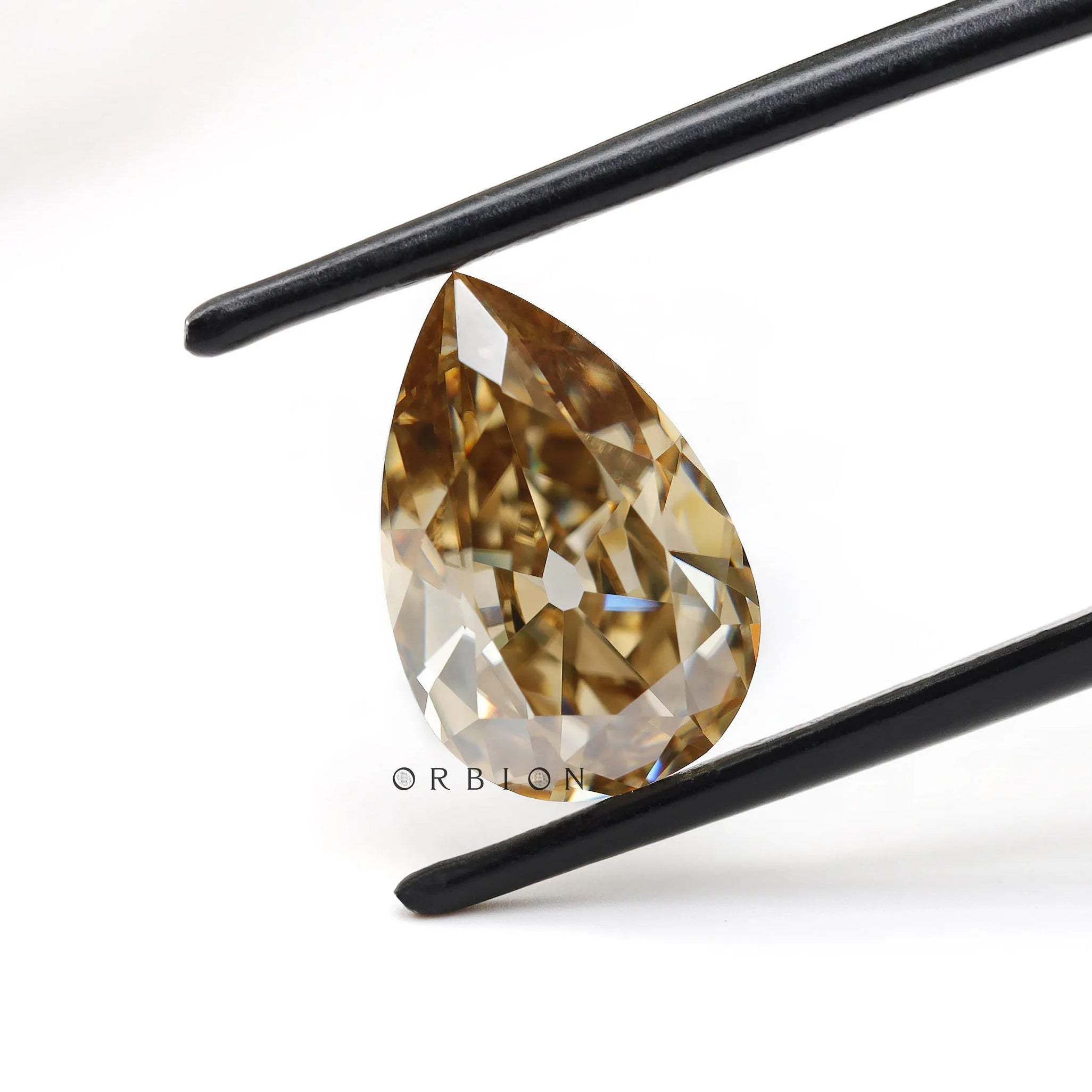 Dark champagne pear moissanite loose stone with vintage cut style