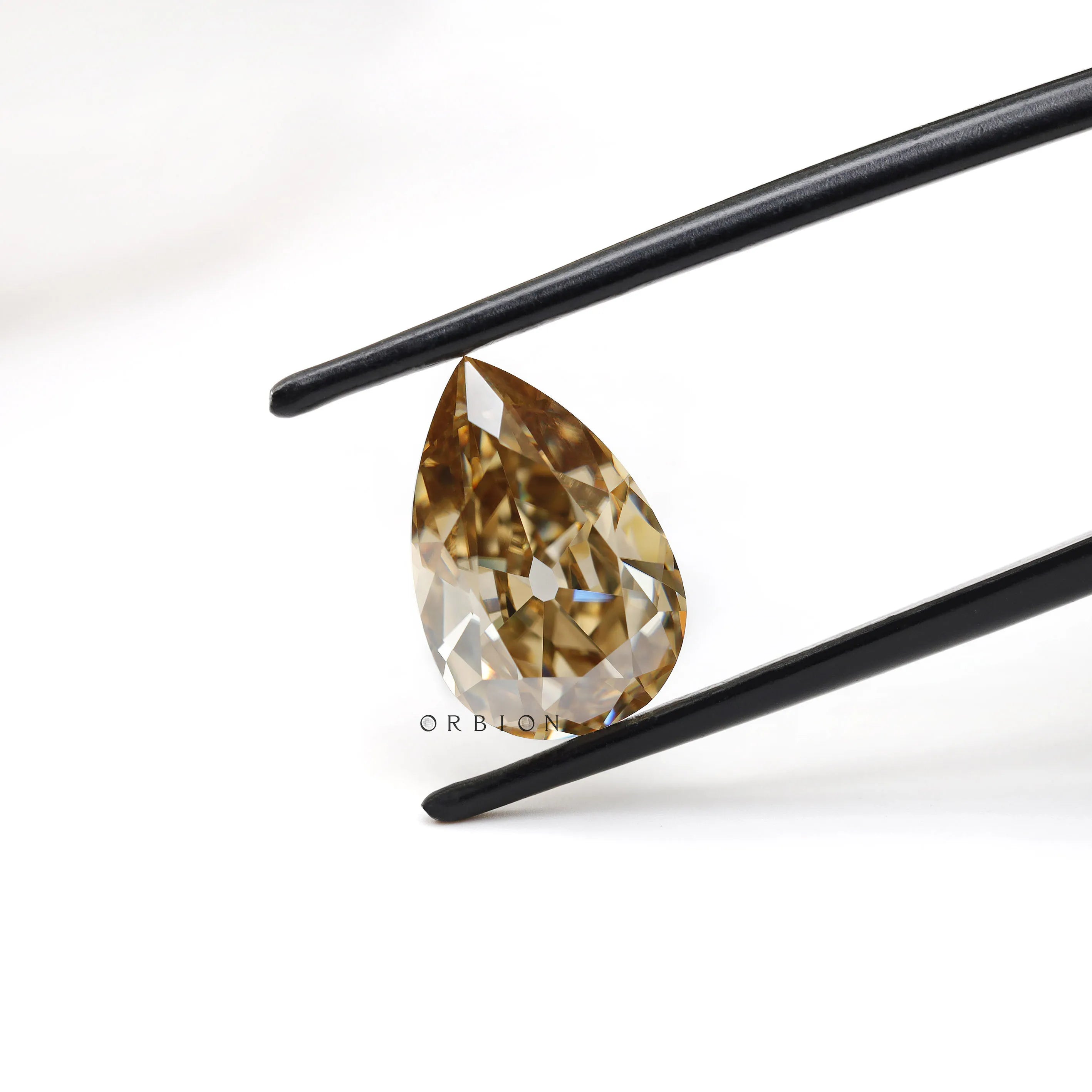 Dark champagne pear moissanite loose stone with vintage cut style