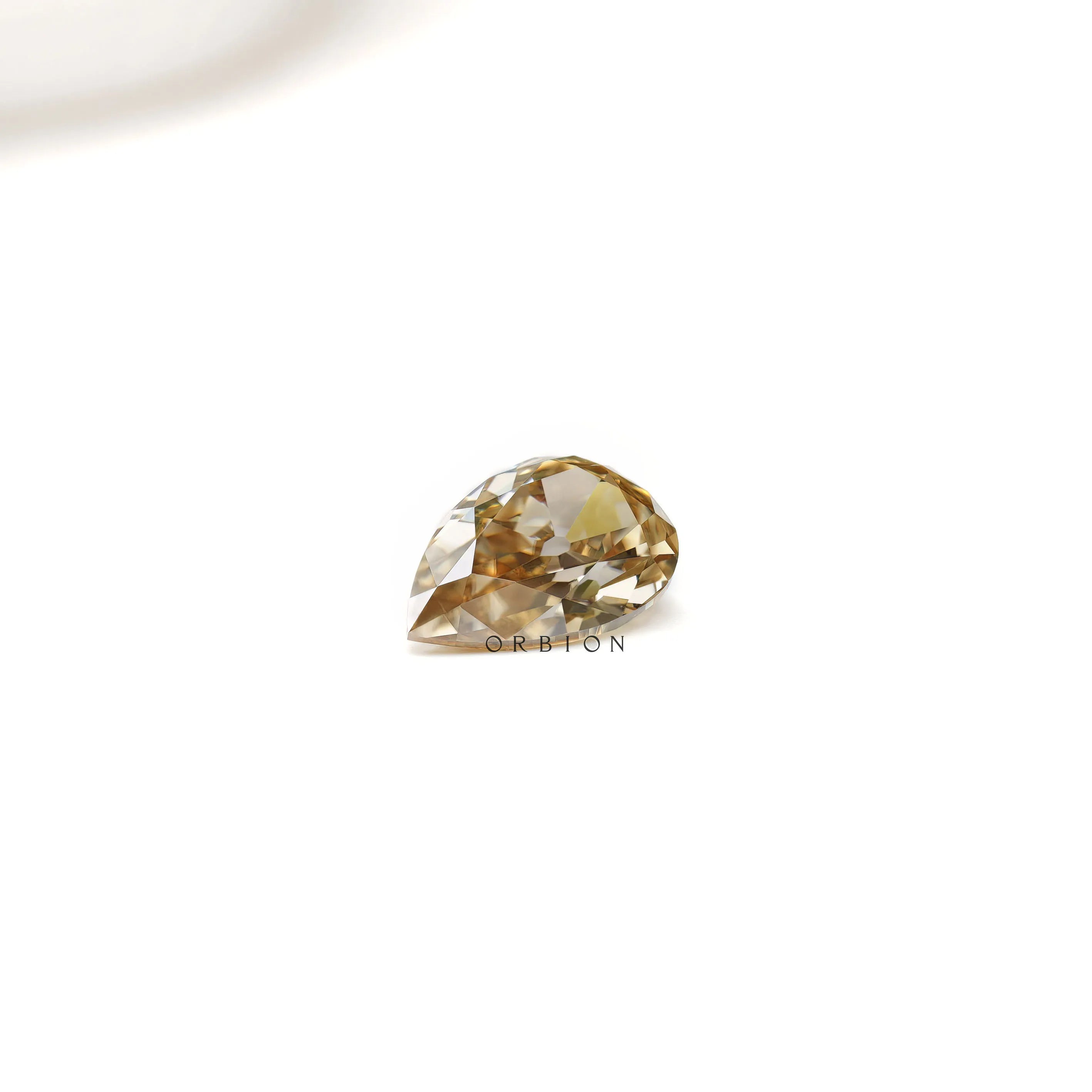 Elegant pear shape moissanite with deep champagne sparkle 3.50 ct