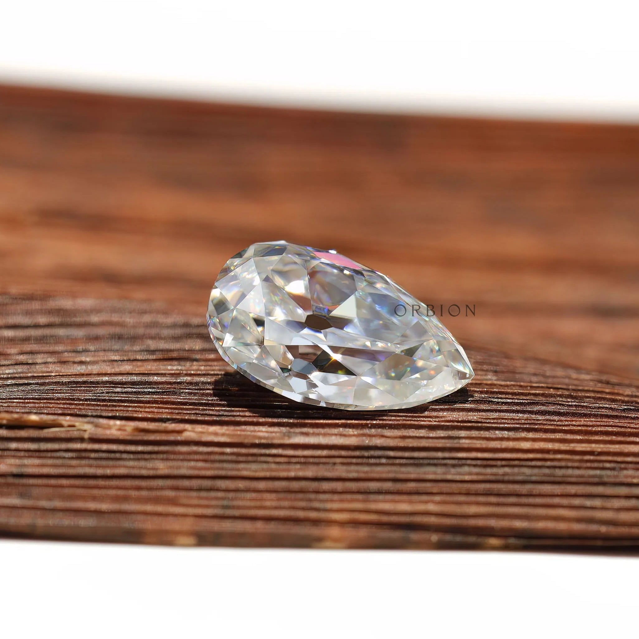 Pear shaped moissanite 4.20 ct colorless antique style stone