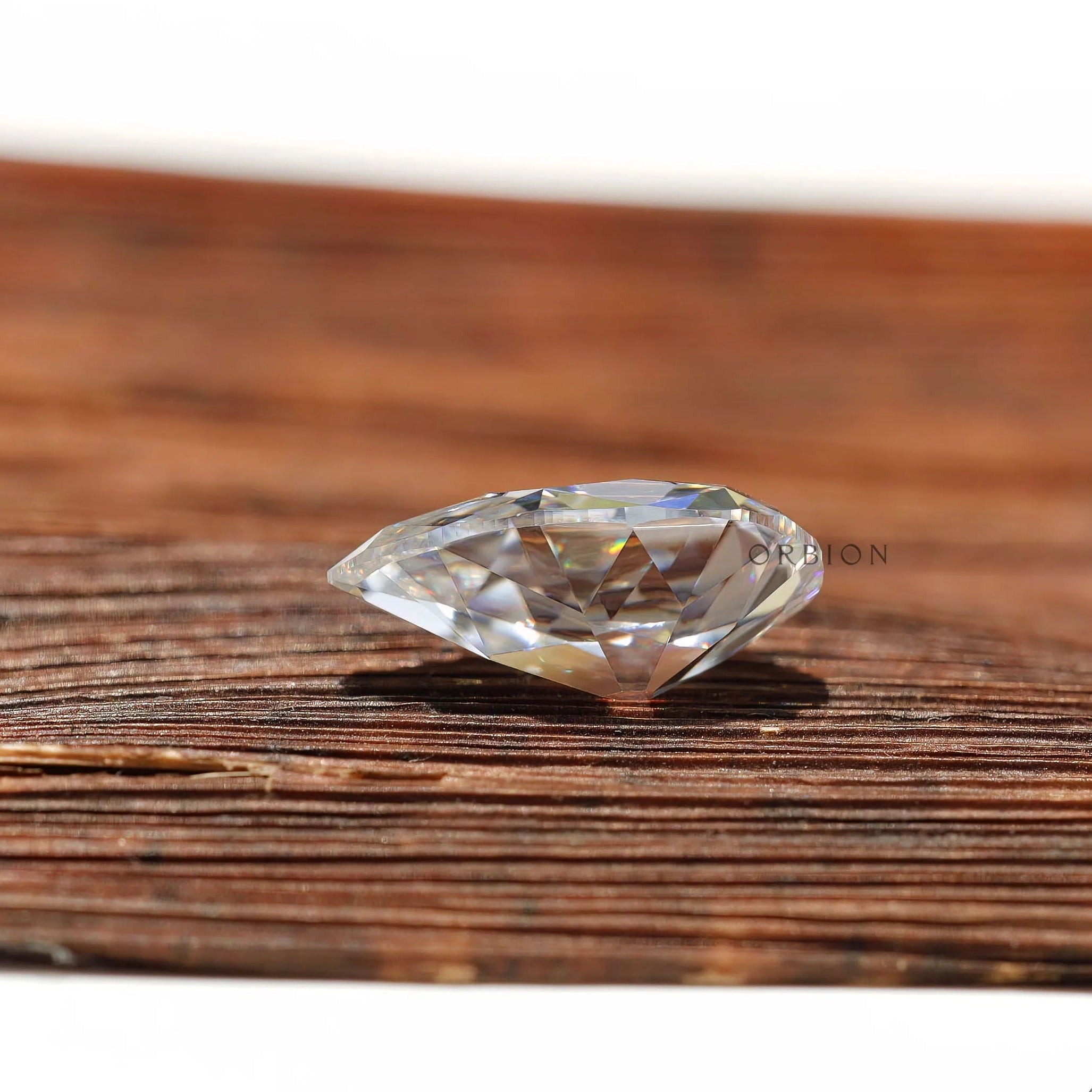 Pear moissanite with vintage faceting and clean colorless tone