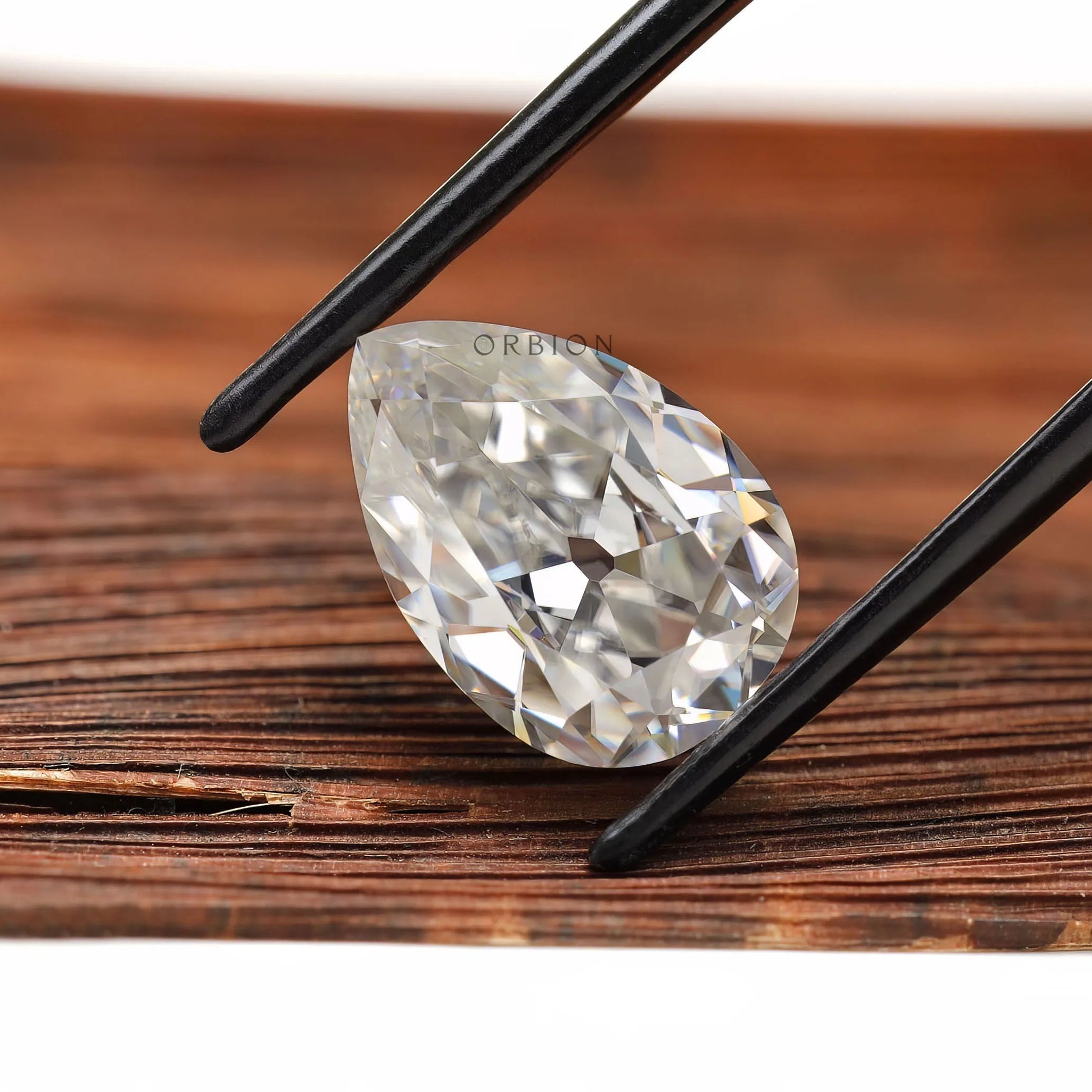4.20 ct Pear moissanite with antique old mine cut clear loose gem